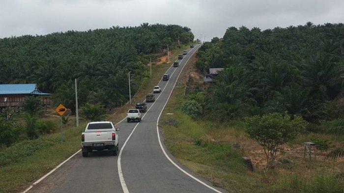 Salah satu ruas jalan perbatasan yang sudah beraspal di wilayah Seimanggaris, Nunukan, Kalimantan Utara.